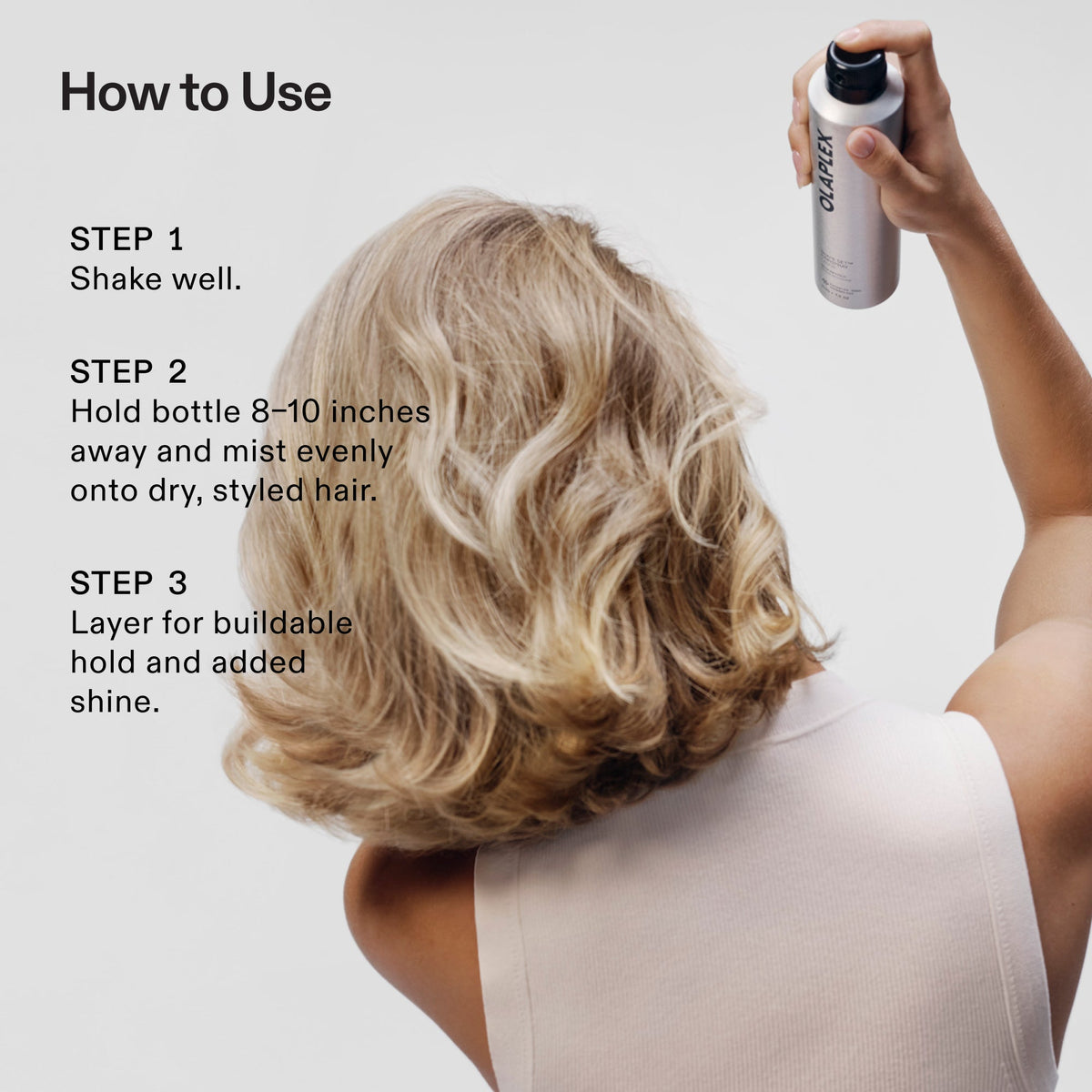 How to use Olaplex Shape Set Hairspray - shake well, mist 8-10 inches from dry styled hair, layer for buildable hold